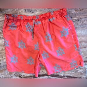 Men’s TURTLESON coral / blue turtle print swim trunks. Size 2XL